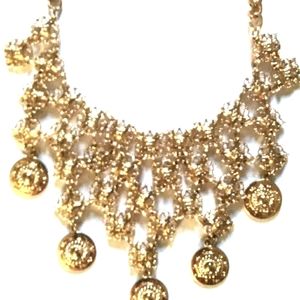 Elegant gold coin Dripping necklace.